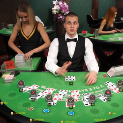 Table de blackjack avec croupiers en direct