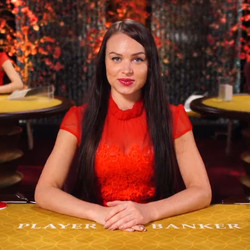 Table de live baccarat d'un casino en ligne avec croupiers en direct